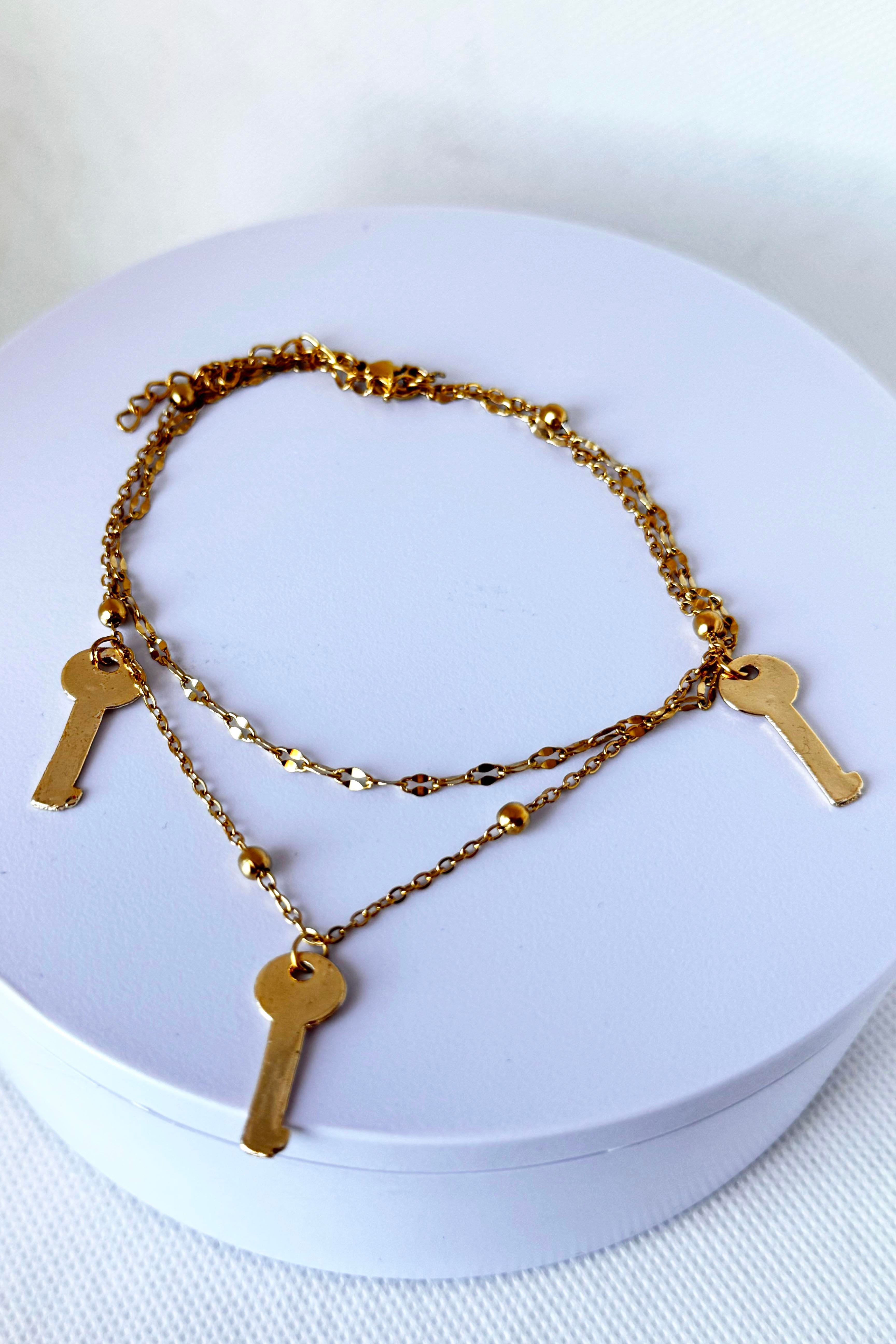 Altın Renk Anahtar Figürlü Çelik Halhal