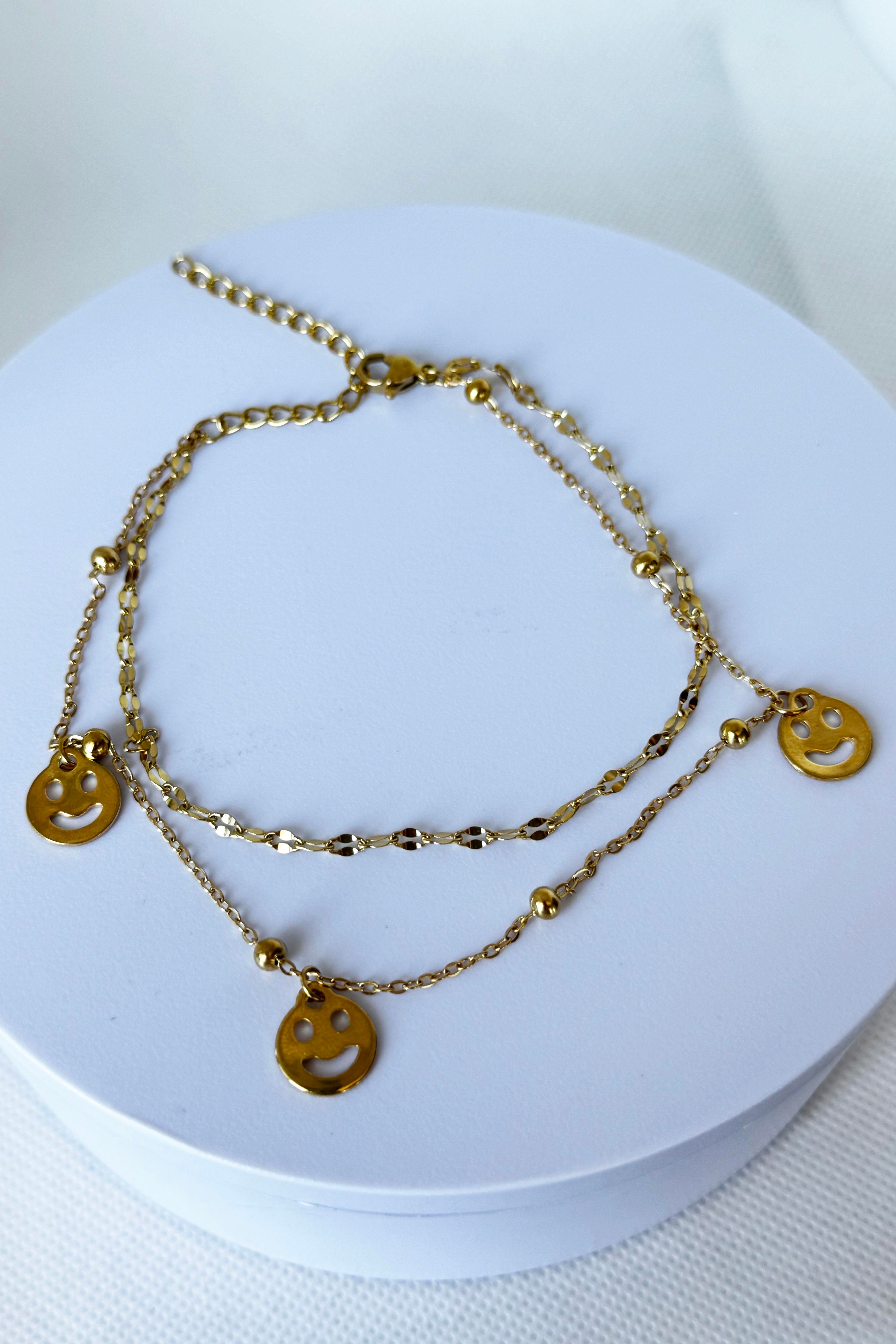 Altın Renk Gülen Yüz Figürlü Çelik Halhal