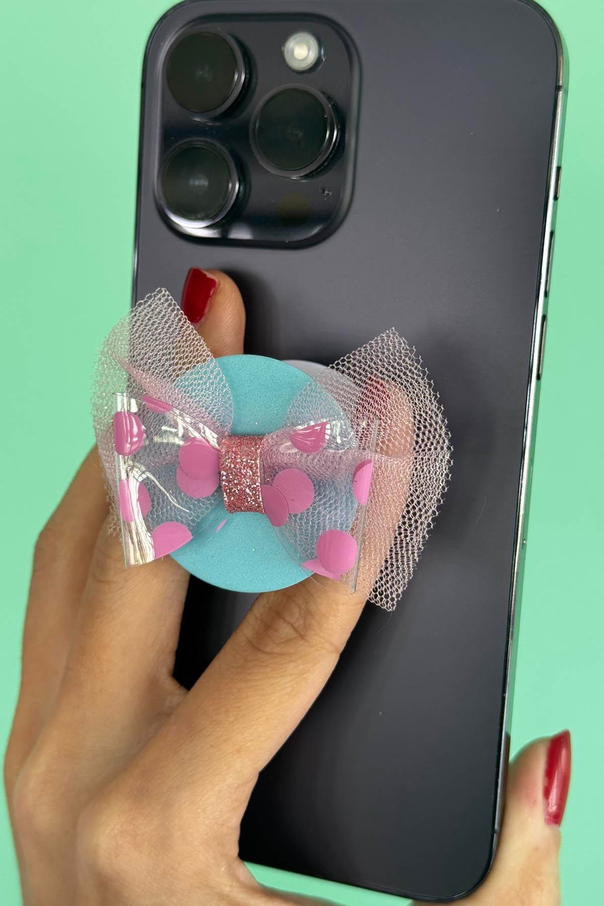 Mavi Ve Pembe Renk Kurdele Figürlü 3D Telefon Tutacağı