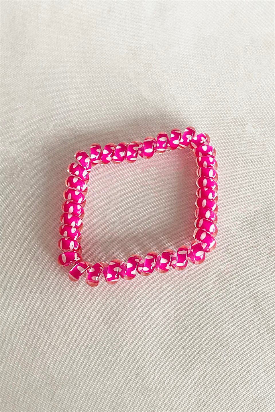 Pembe Renk Puantiyeli Helezon Lastik Toka