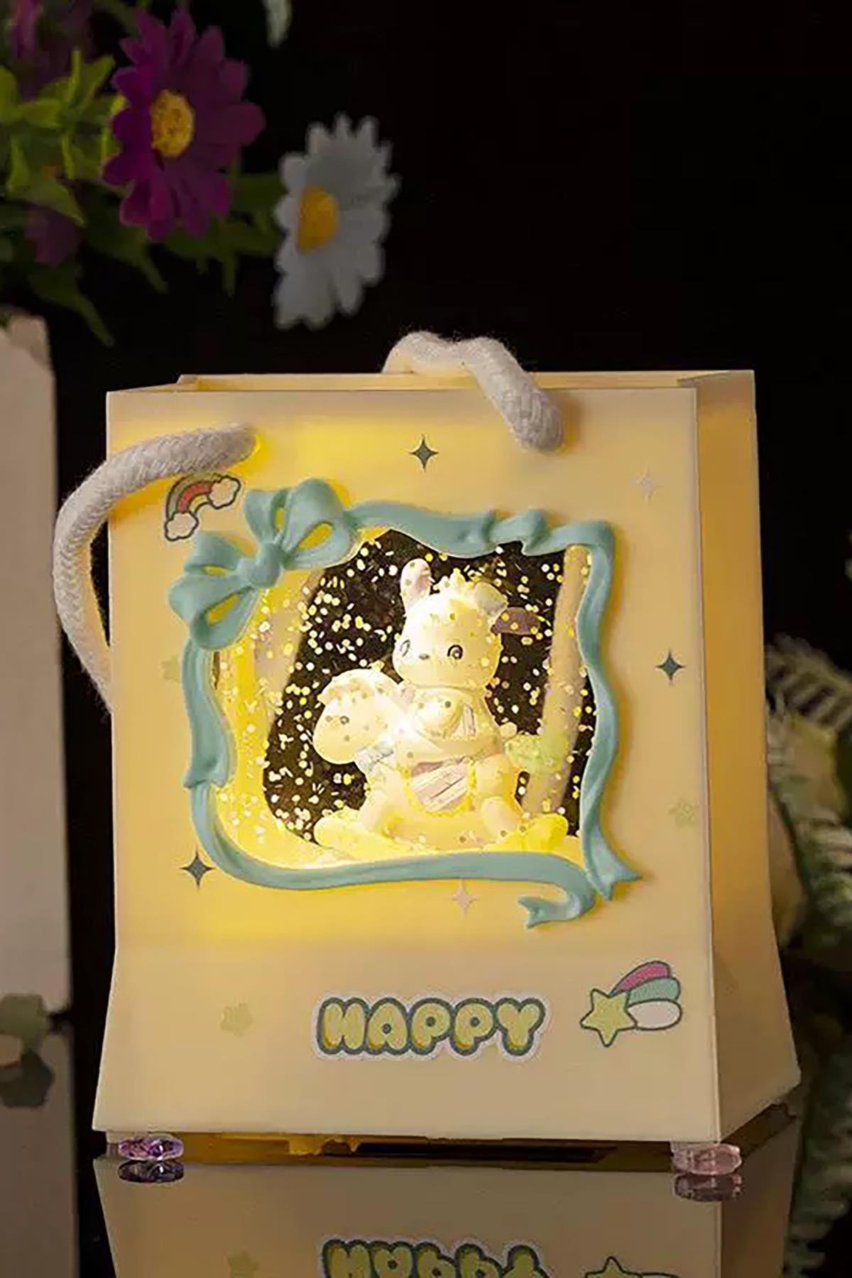 Sarı Renk Tavşan Figürlü Askı Detaylı Müziklı Işıklı Kar Küresi