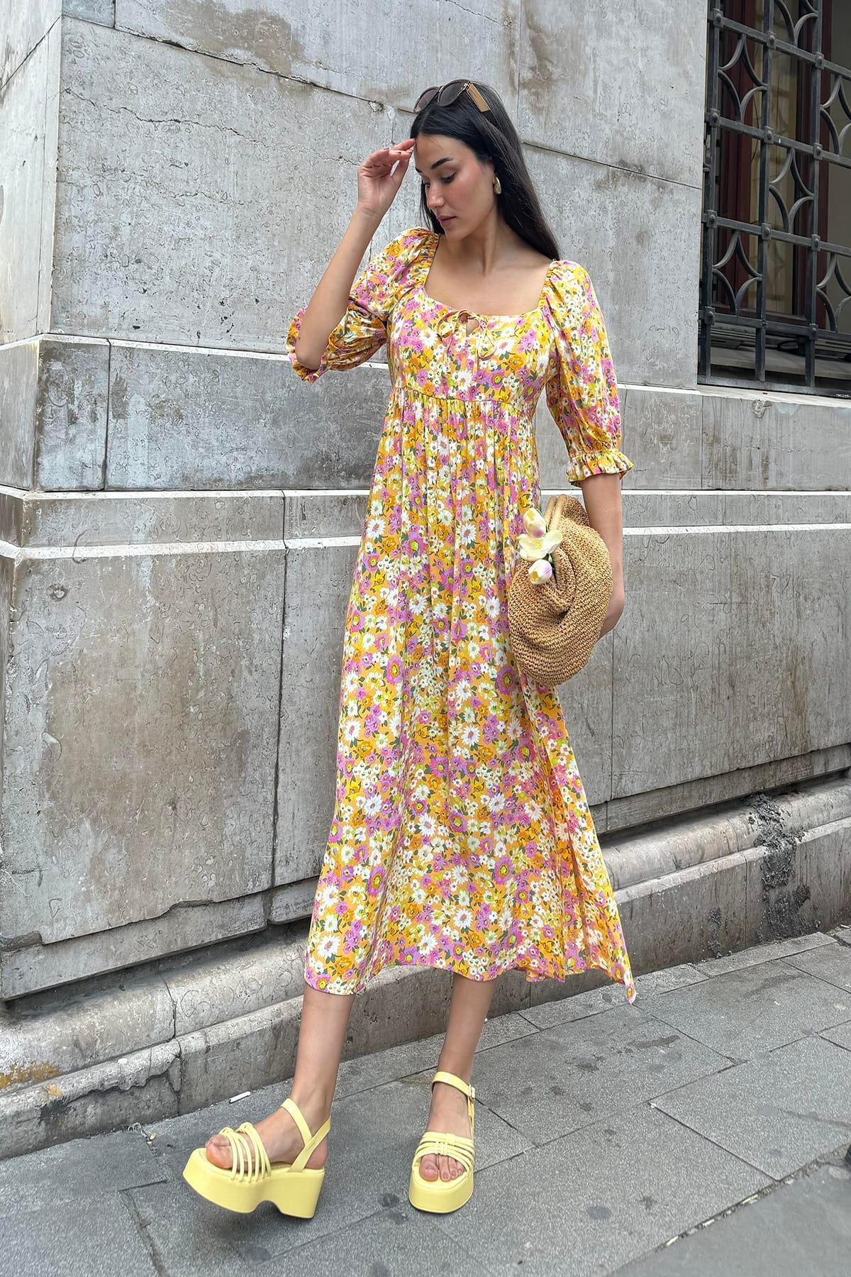 Now Moda Doğal Viskon Bel Büzgülü Desenli Yırtmaçlı Uzun Sarı Elbise Now Moda Doğal Viskon Bel Büzgülü Desenli Yırtmaçlı Uzun Sarı Elbise