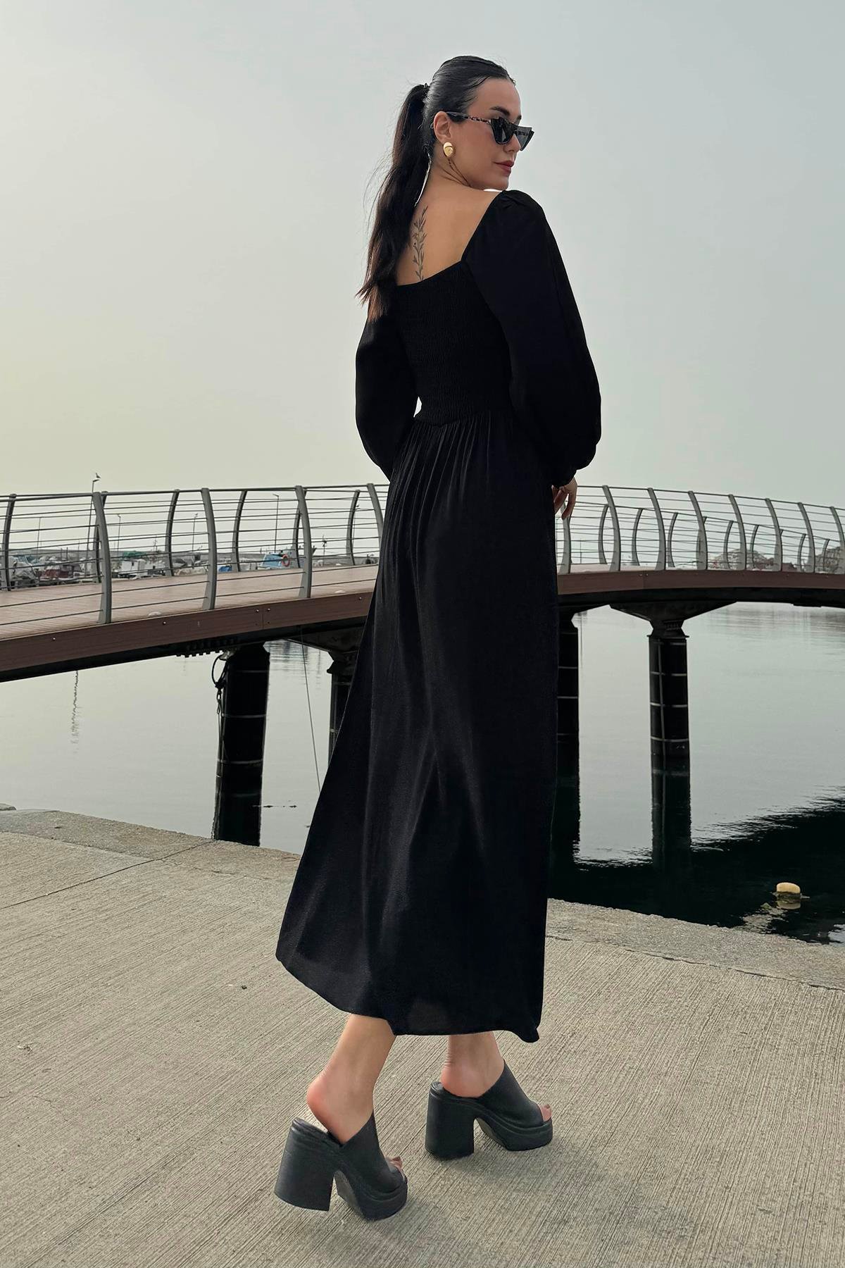 Now Moda Omuz Lastikli Gipeli Uzun Kol Siyah Elbise Now Moda Omuz Lastikli Gipeli Uzun Kol Siyah Elbise