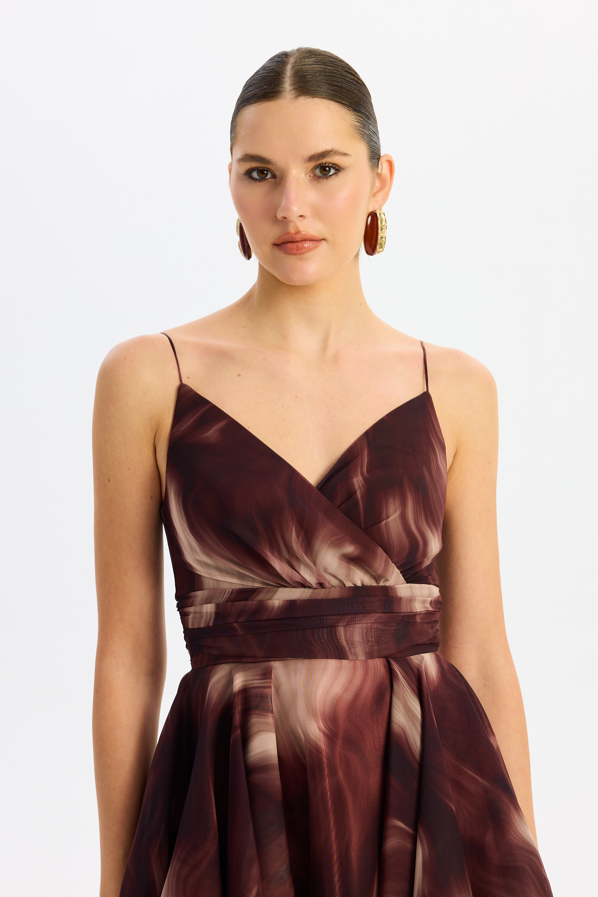 55886-38Eva FashionEva Fashion Kahve Askılı Yırtmaçlı Desenli Abiye Elbise