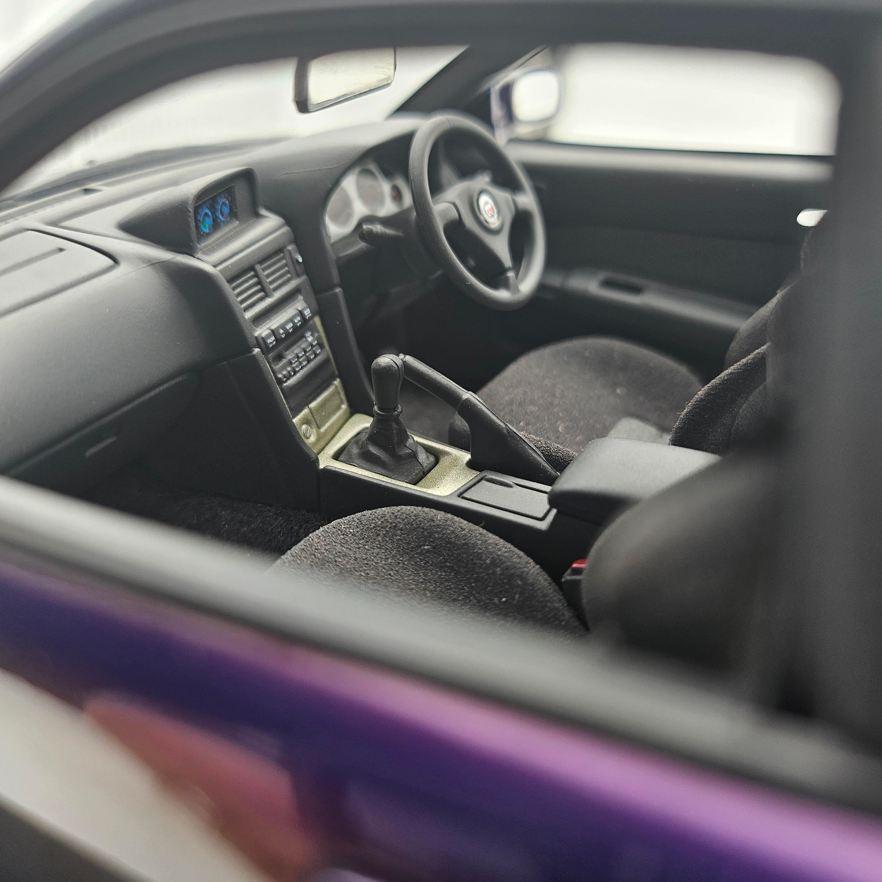 hpi.racingAUTOart - Nissan Skyline R34 GT-R 1999 Midnight Purple 1/18
