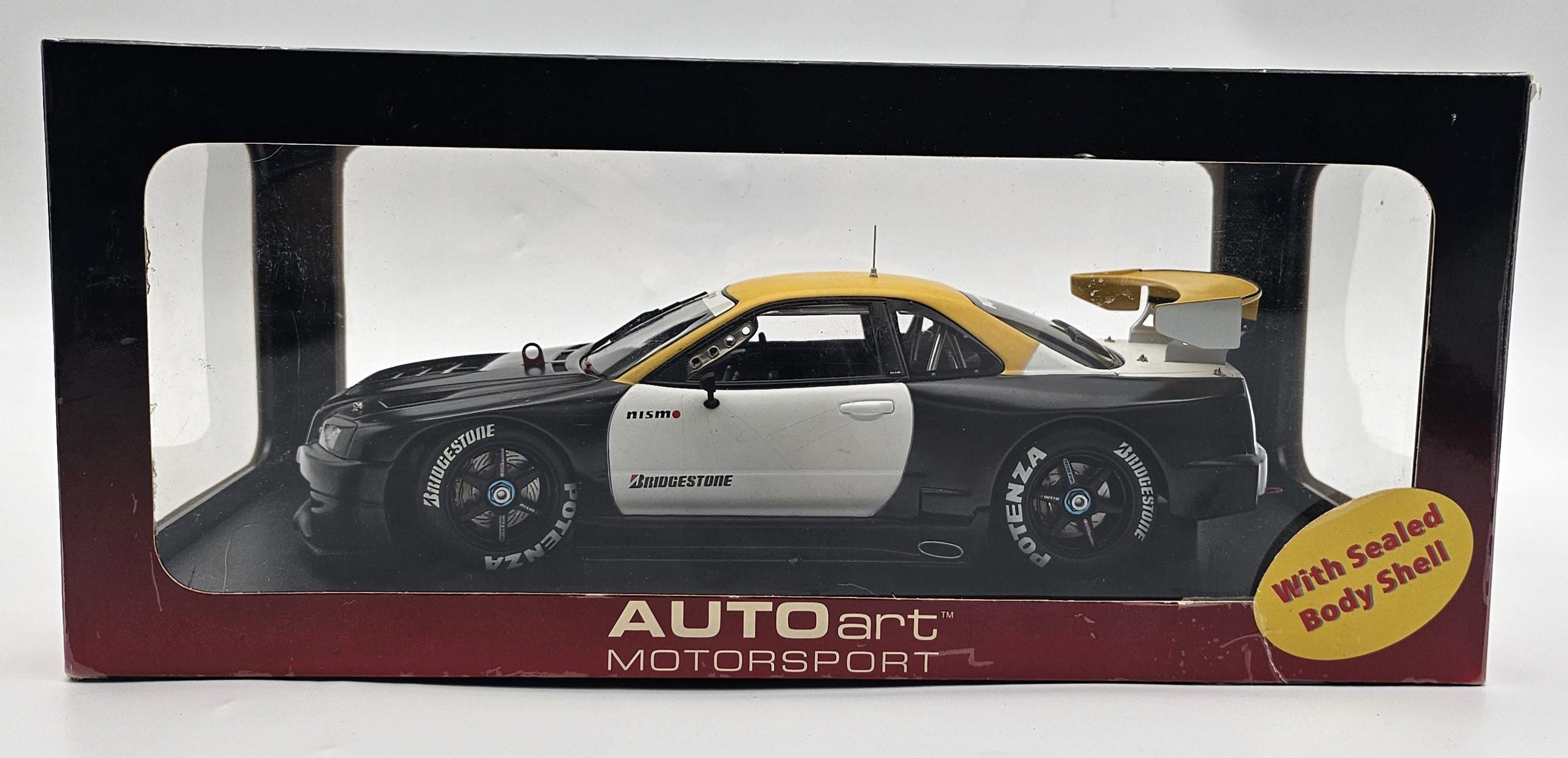 hpi.racingAUTOart - Nissan Skyline R34 JGTC 2001 Test Car 1/18