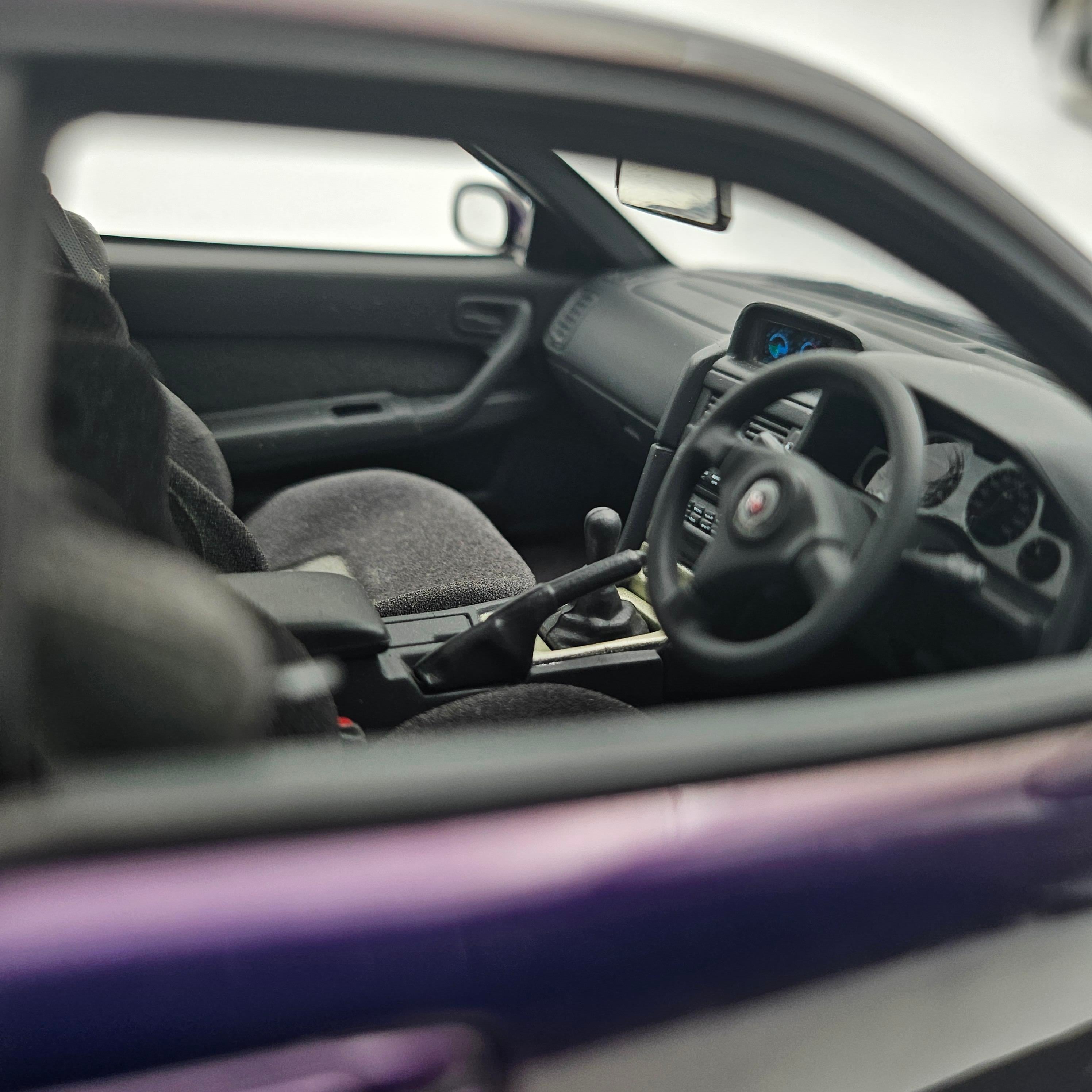 hpi.racingAUTOart - Nissan Skyline R34 GT-R 1999 Midnight Purple 1/18
