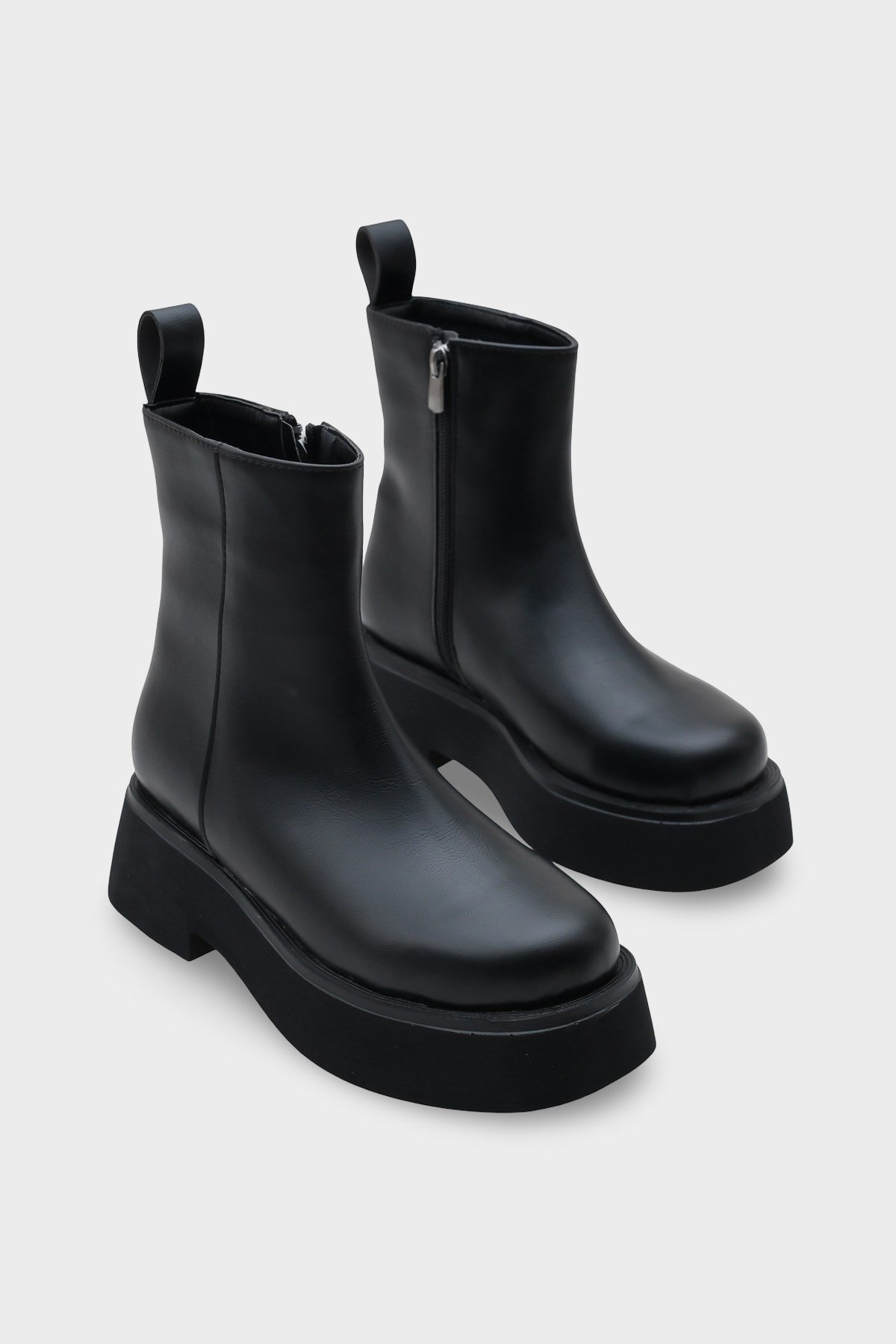 Capone Round Toe Side Zipper Track Sole Woman Boots