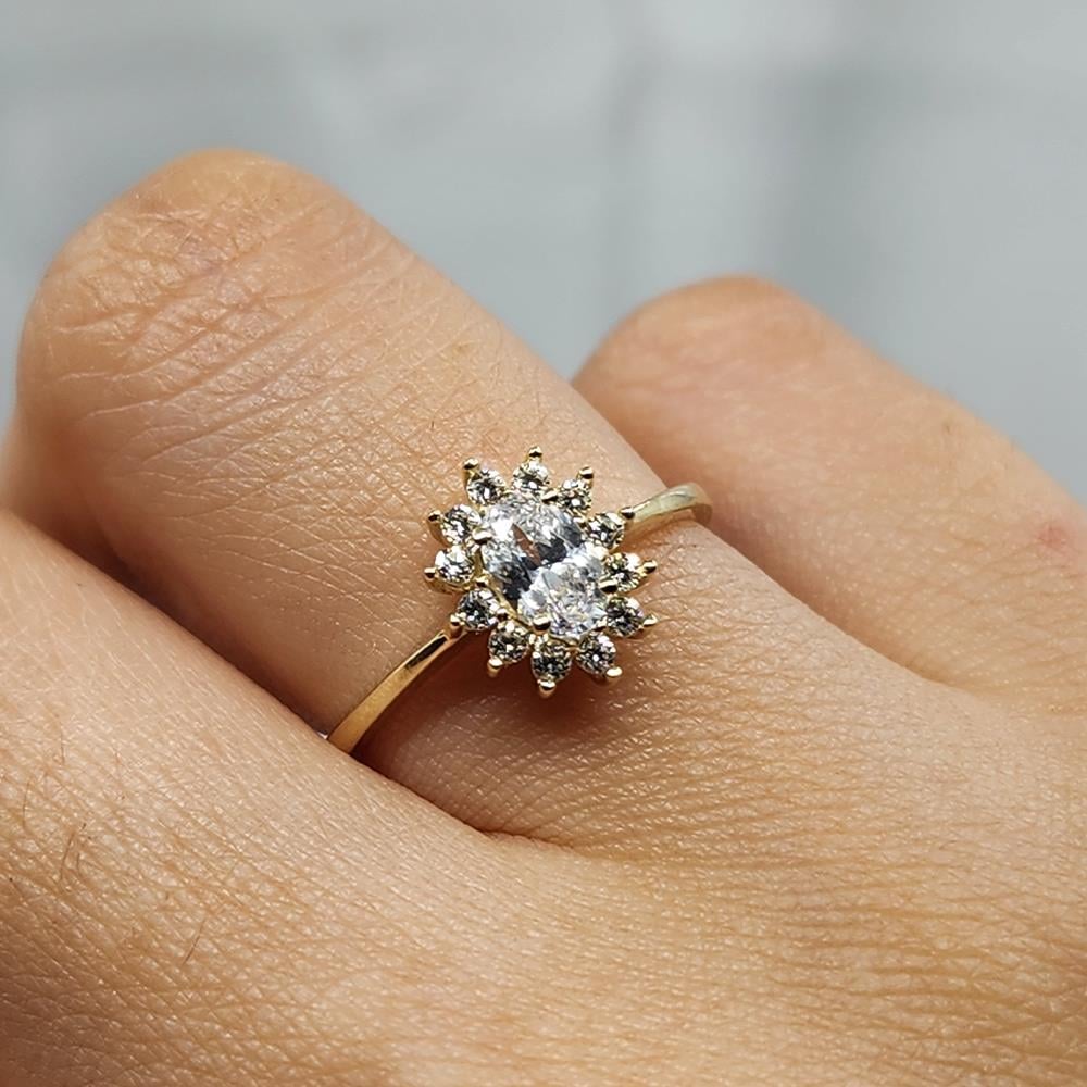 FasekgoldGÜMÜŞ YÜZÜK1,10 Karat Oval 0,24 Karat Signity Swarovski Taşlı Pırlanta Montörü Anturajlı 925 Ayar Gümüş Yüzük