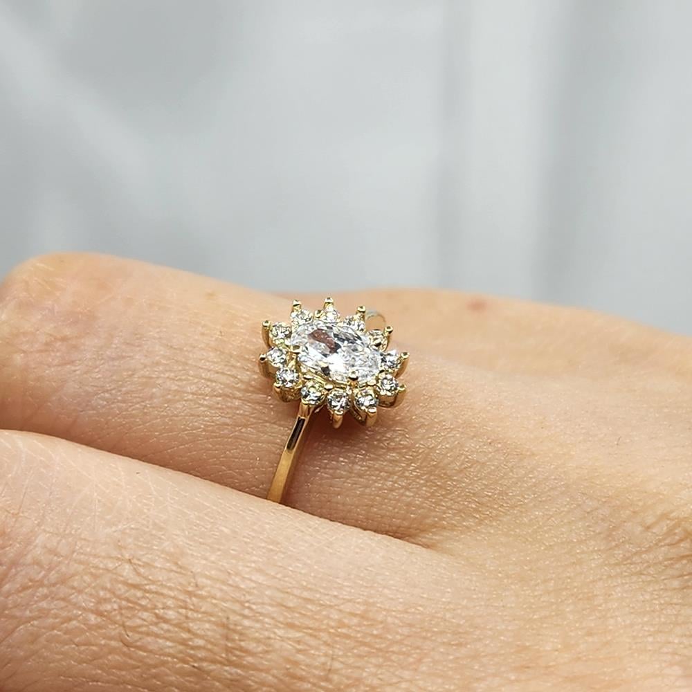FasekgoldGÜMÜŞ YÜZÜK1,10 Karat Oval 0,24 Karat Signity Swarovski Taşlı Pırlanta Montörü Anturajlı 925 Ayar Gümüş Yüzük