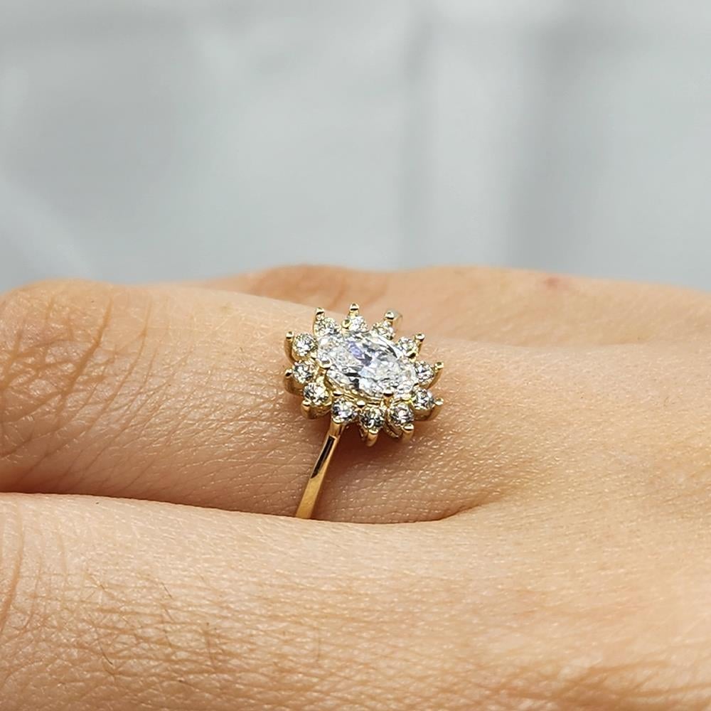 FasekgoldGÜMÜŞ YÜZÜK1,10 Karat Oval 0,24 Karat Signity Swarovski Taşlı Pırlanta Montörü Anturajlı 925 Ayar Gümüş Yüzük