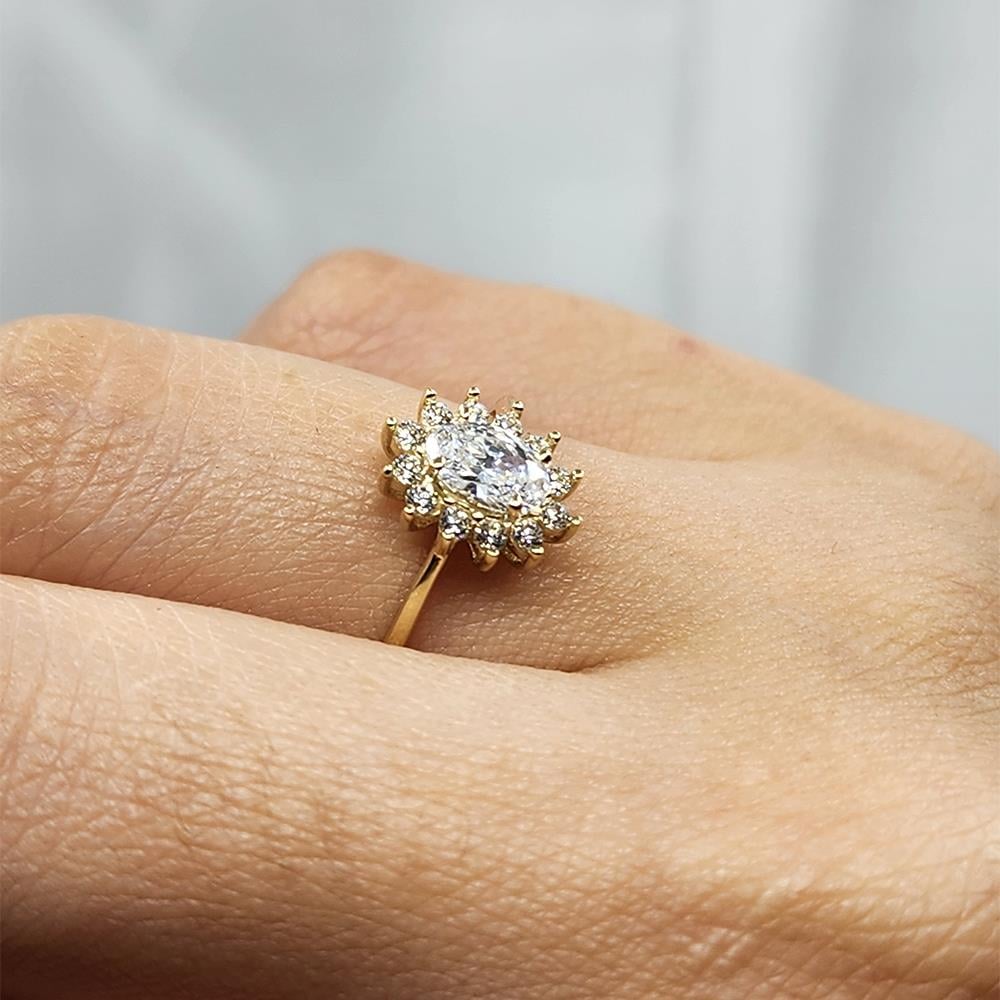 FasekgoldGÜMÜŞ YÜZÜK1,10 Karat Oval 0,24 Karat Signity Swarovski Taşlı Pırlanta Montörü Anturajlı 925 Ayar Gümüş Yüzük
