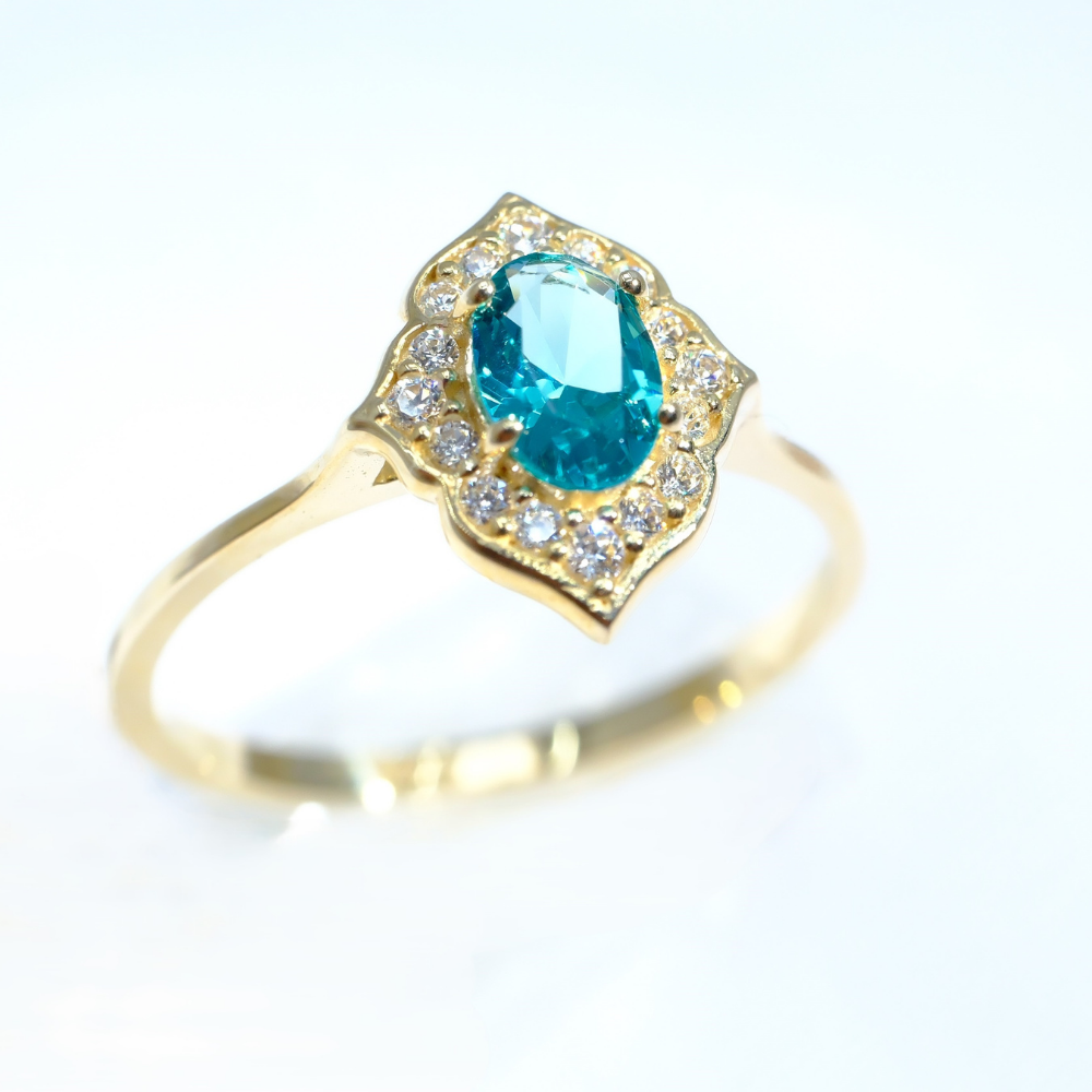 FasekGoldGÜMÜŞMavi Topaz Oval Kesim Yan Zirkon Taşlı Modern Tasarım 925 Ayar Gümüş Yüzük Tektaş Günlük-Hediyelik
