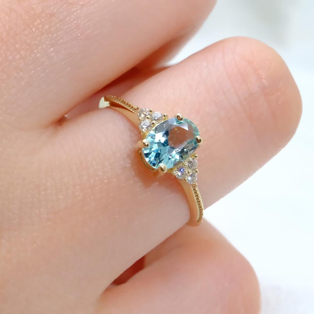 FasekGoldGÜMÜŞOval Kesim Blue Topaz Yan Zirkon Taşlı Modern Tasarım 925 Ayar Gümüş Kadın Yüzük Günlük-Hediyelik