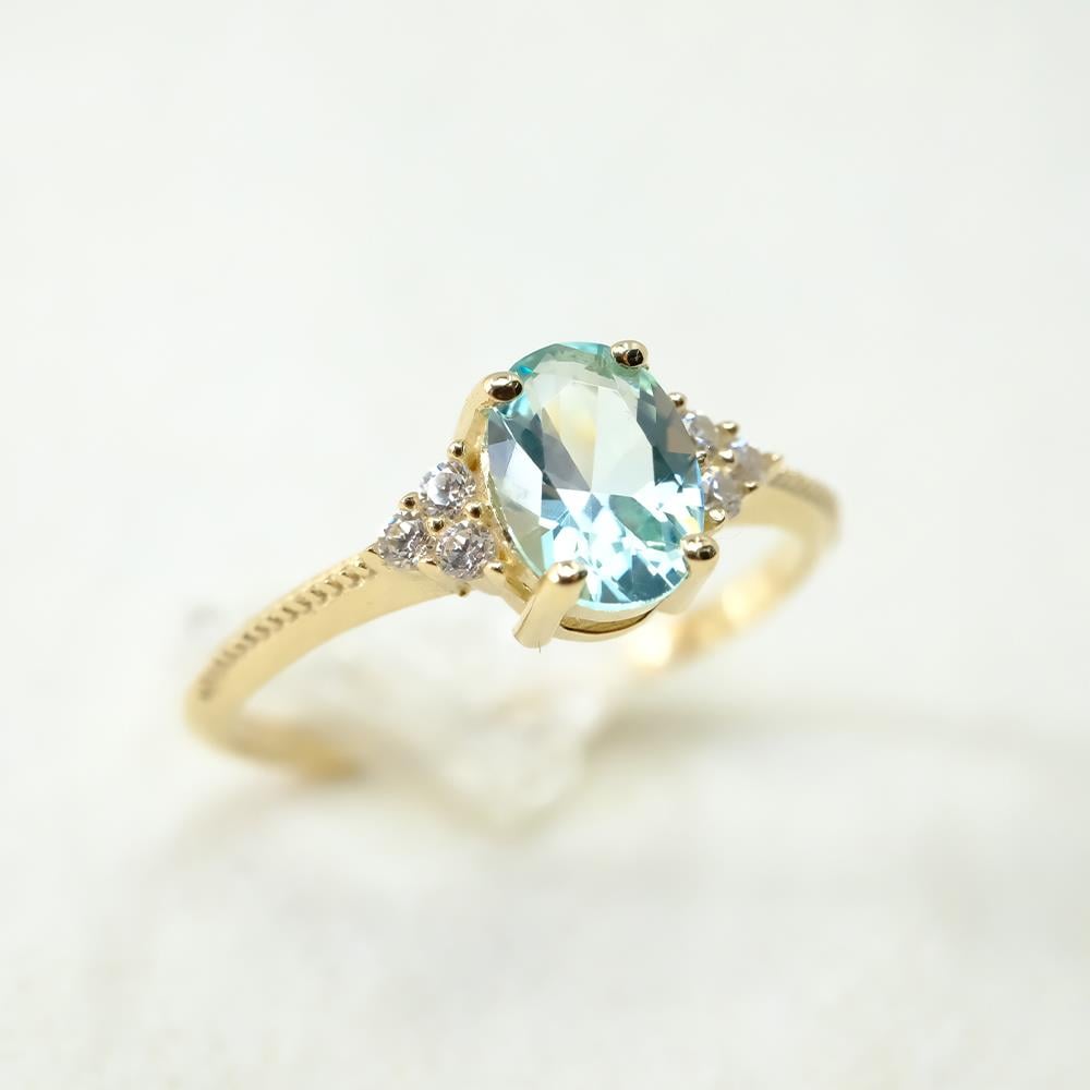 FasekGoldGÜMÜŞOval Kesim Blue Topaz Yan Zirkon Taşlı Modern Tasarım 925 Ayar Gümüş Kadın Yüzük Günlük-Hediyelik