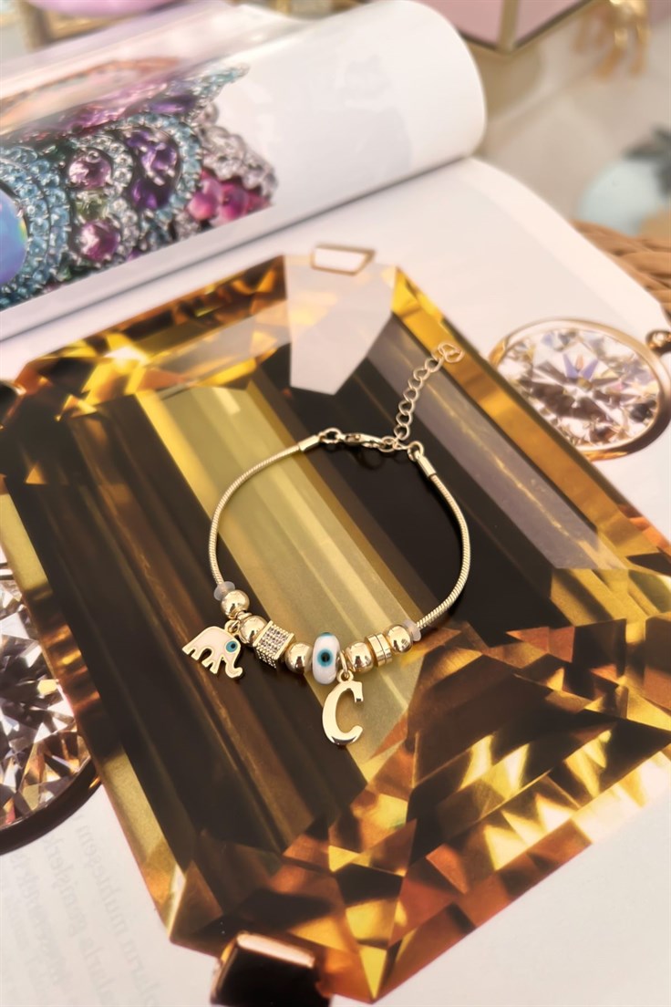 C Harfli ve Beyaz Mineli Fil Figürlü Nazar Bileklik Gold