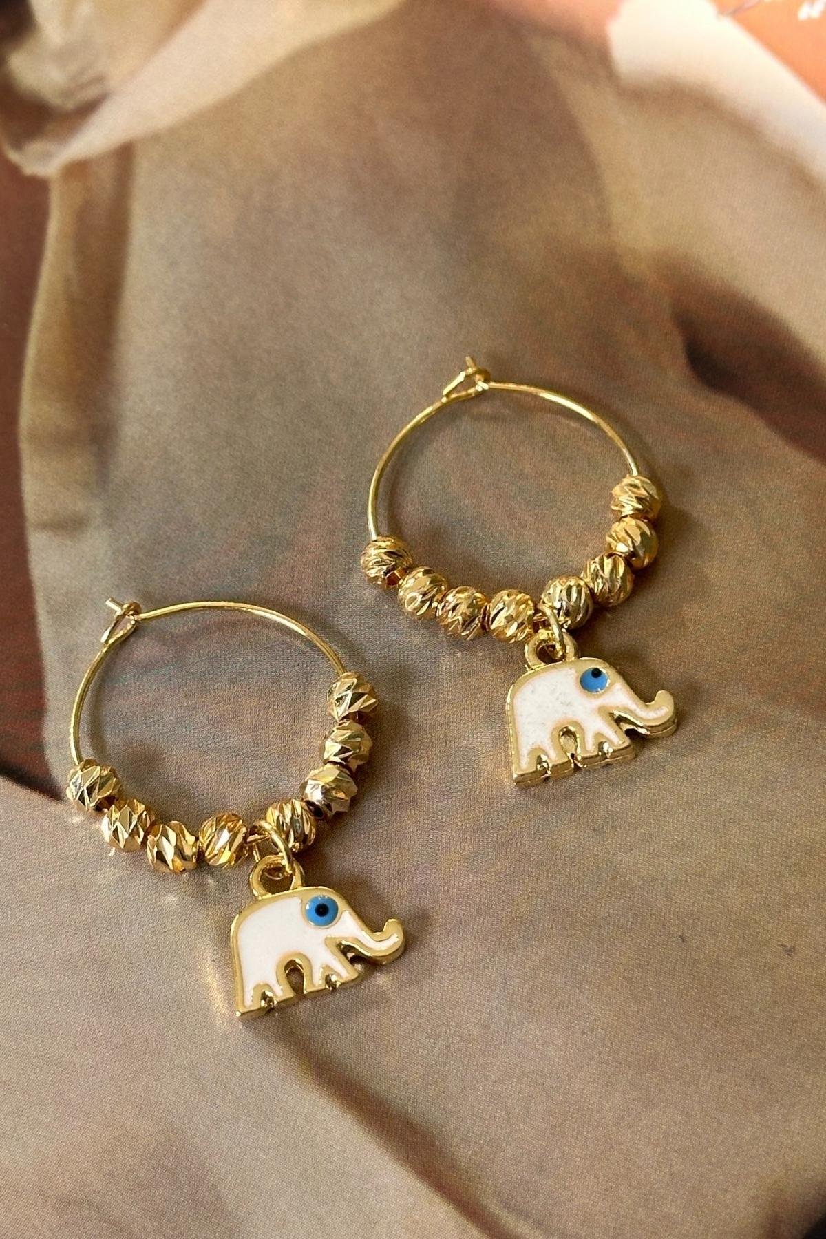 Dorika Model Fil Detaylı Küpe