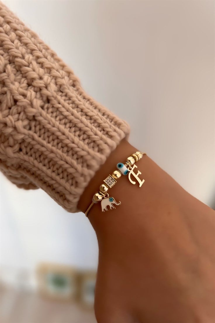 F Harfli ve Beyaz Mineli Fil Figürlü Nazar Bileklik Gold