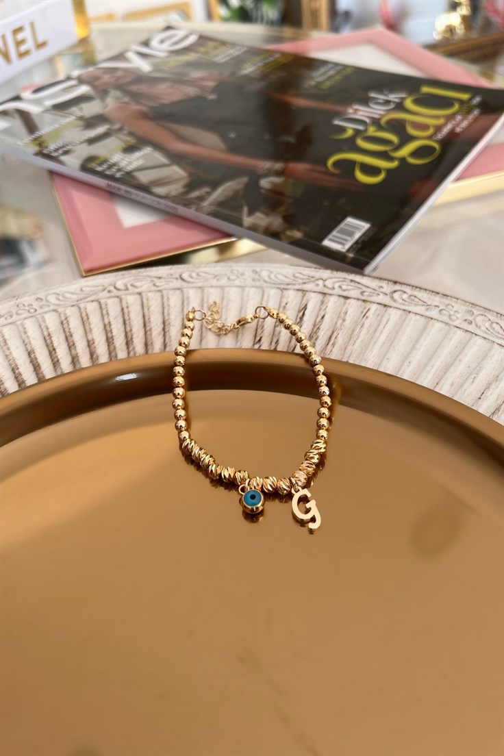 G Harf ve Nazar Sallantılı Dorika Bileklik Gold