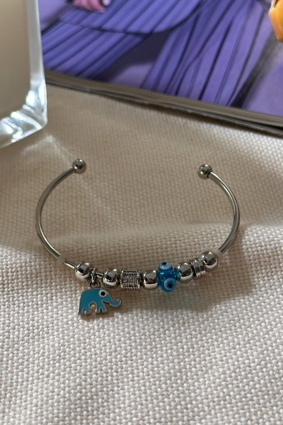 Gümüş Renk Mavi Mineli Fil Model Altı Açık Kelepçe