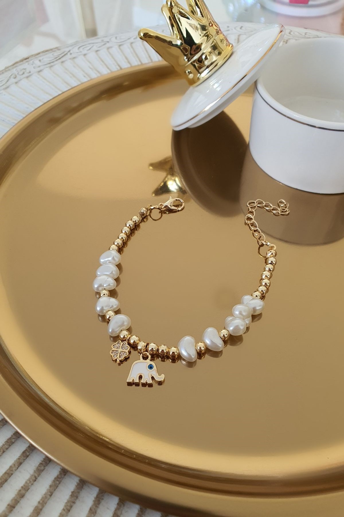 İnci Sıralı Gold Topçuk Model Fil ve Zirkon Taşlı Yonca Sallantılı Bileklik Gold
