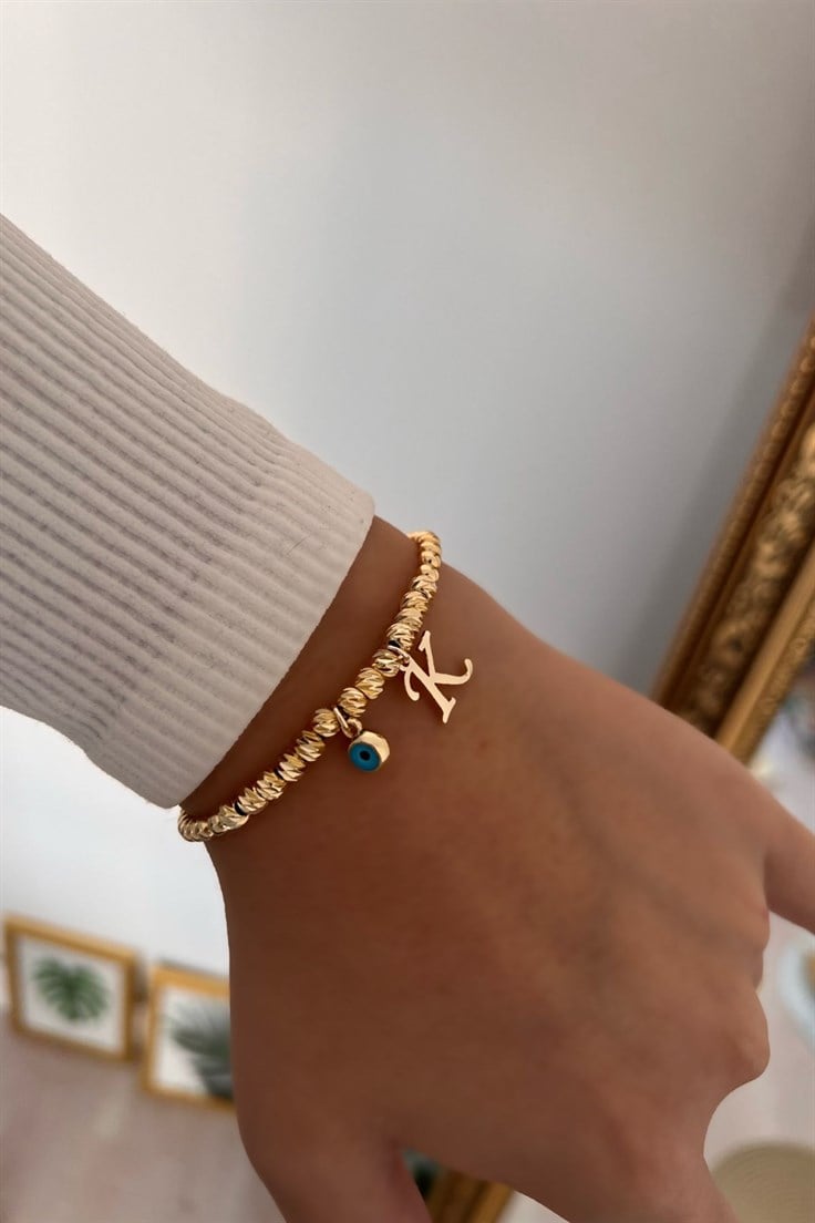 K Harf ve Nazar Sallantılı Dorika Bileklik Gold