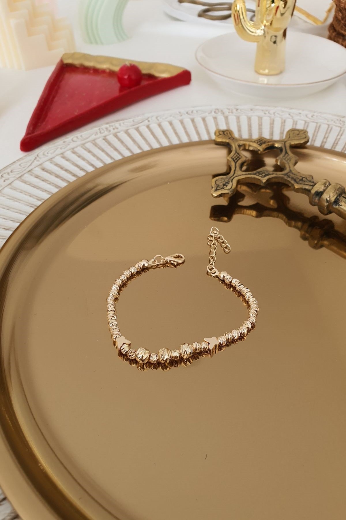 Kelebek Sıralı Dorika Model Bileklik Gold