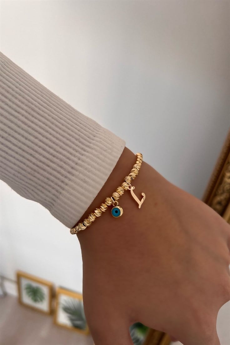 L Harf ve Nazar Sallantılı Dorika Bileklik Gold