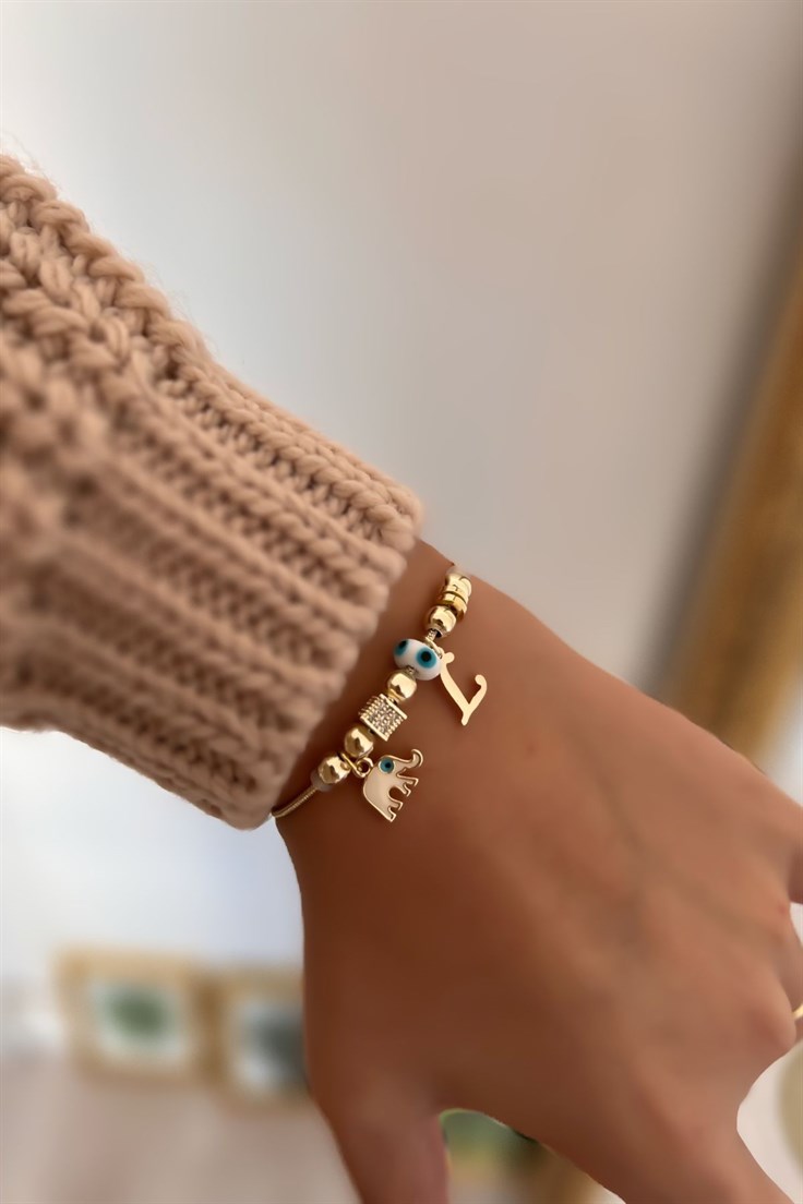 L Harfli ve Beyaz Mineli Fil Figürlü Nazar Bileklik Gold