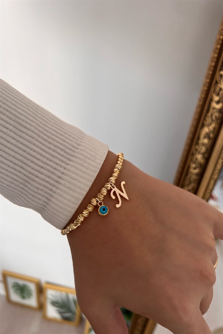 N Harf ve Nazar Sallantılı Dorika Bileklik Gold