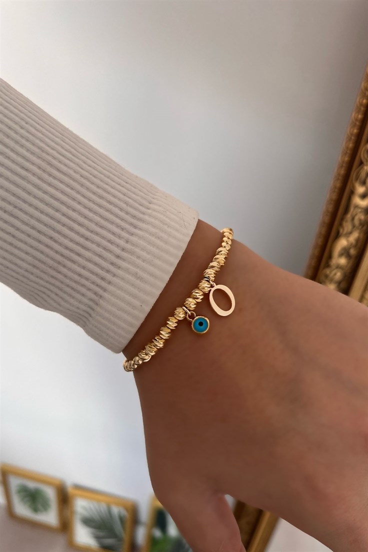 O Harf ve Nazar Sallantılı Dorika Bileklik Gold