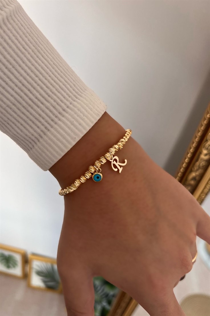 R Harf ve Nazar Sallantılı Dorika Bileklik Gold