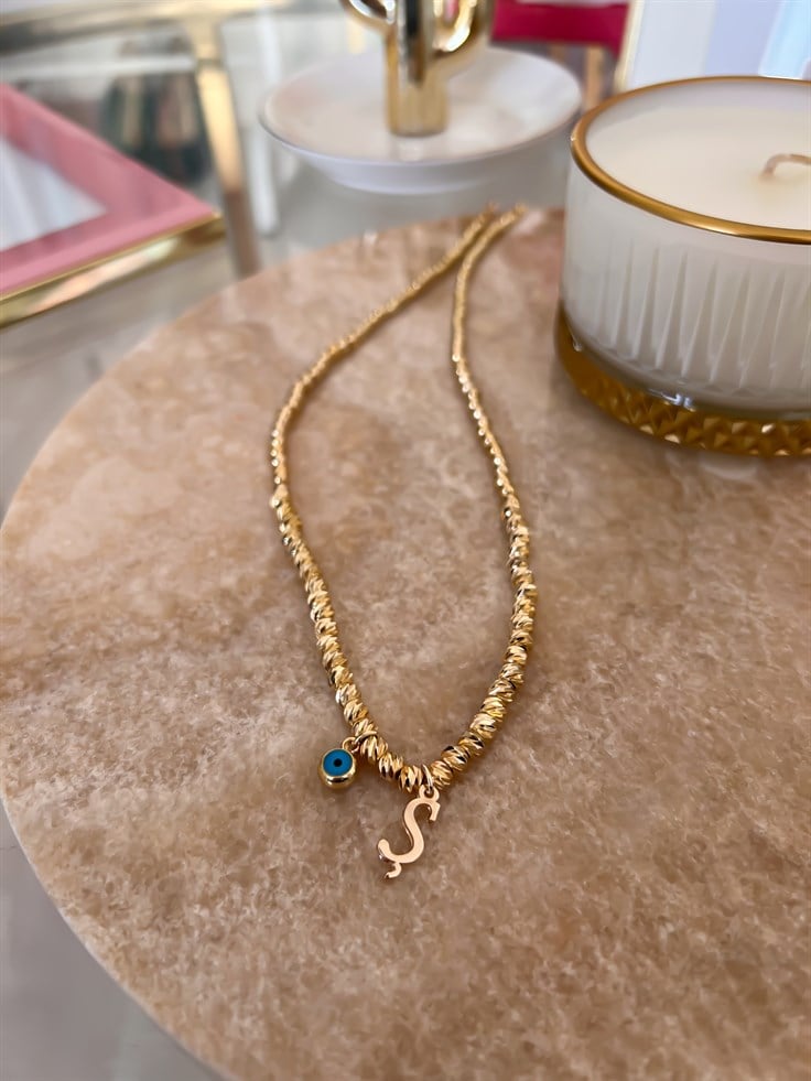 Ş Harfli ve Nazar Detaylı Dorika Kolye Gold