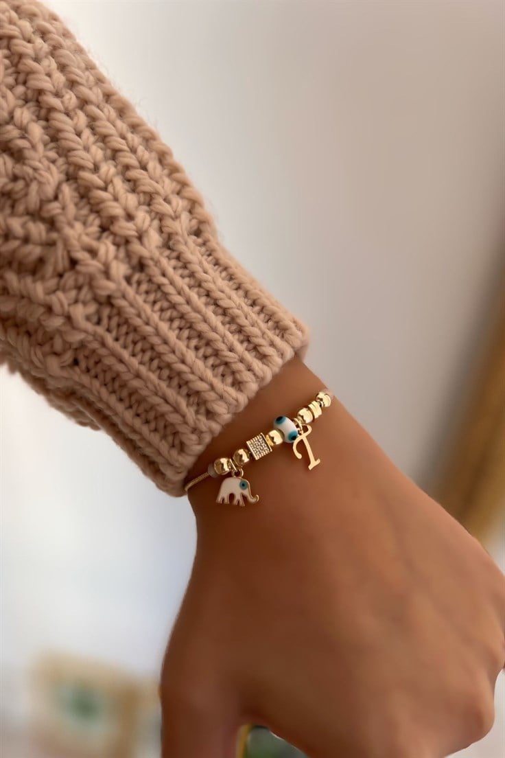 T Harfli ve Beyaz Mineli Fil Figürlü Nazar Bileklik Gold