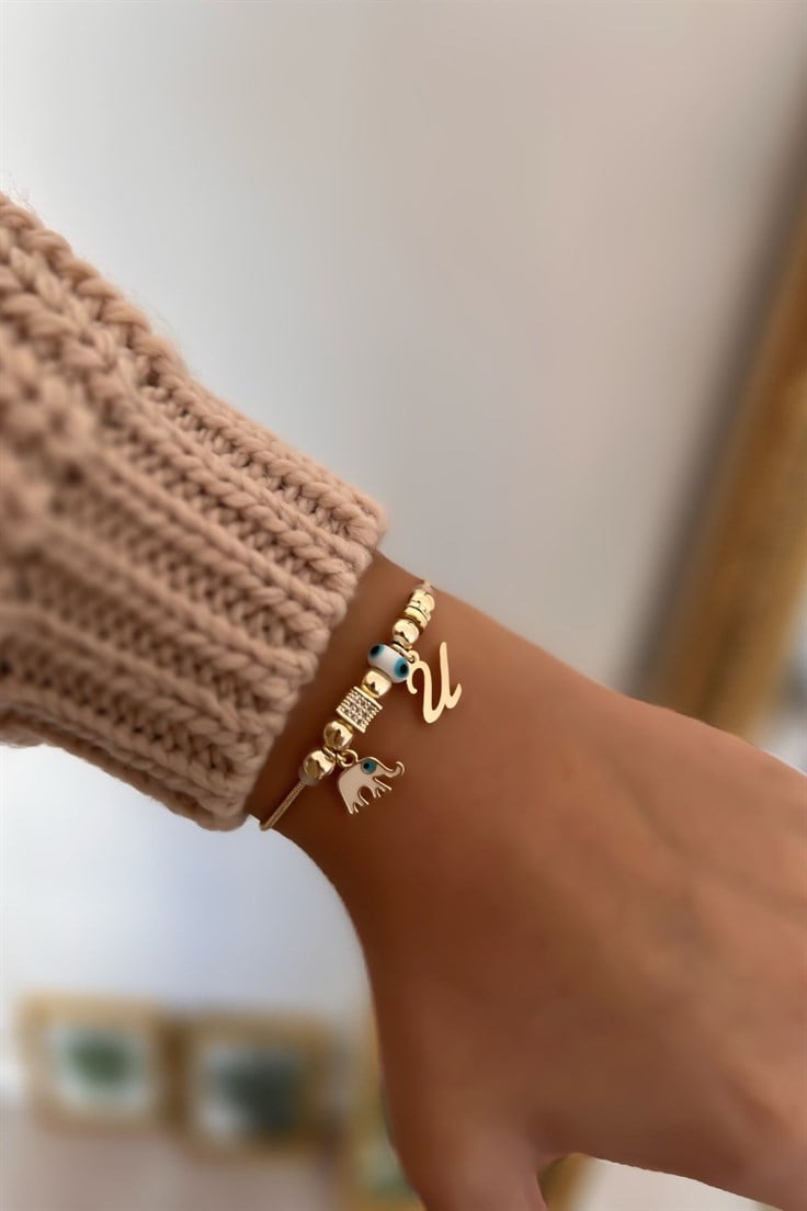 U Harfli ve Beyaz Mineli Fil Figürlü Nazar Bileklik Gold