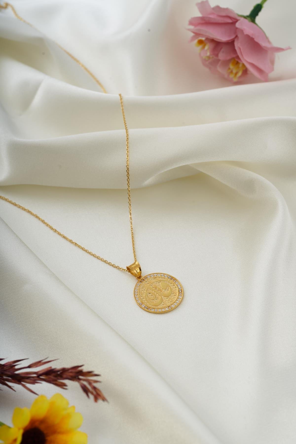 Kur'an'da 'De Ki' Kolye