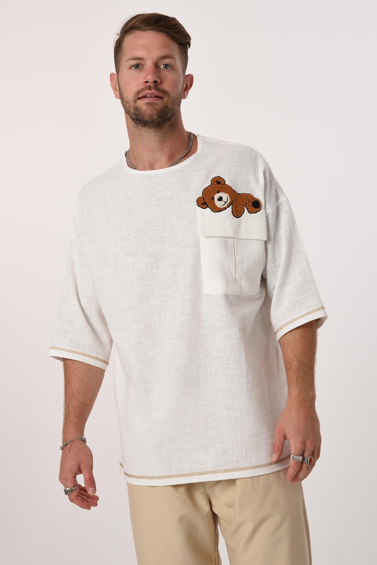 R-3703 Tek Cep Kapaklı Ayı Nakışlı Eteği Kolu Karyokalı Keten Tshirt