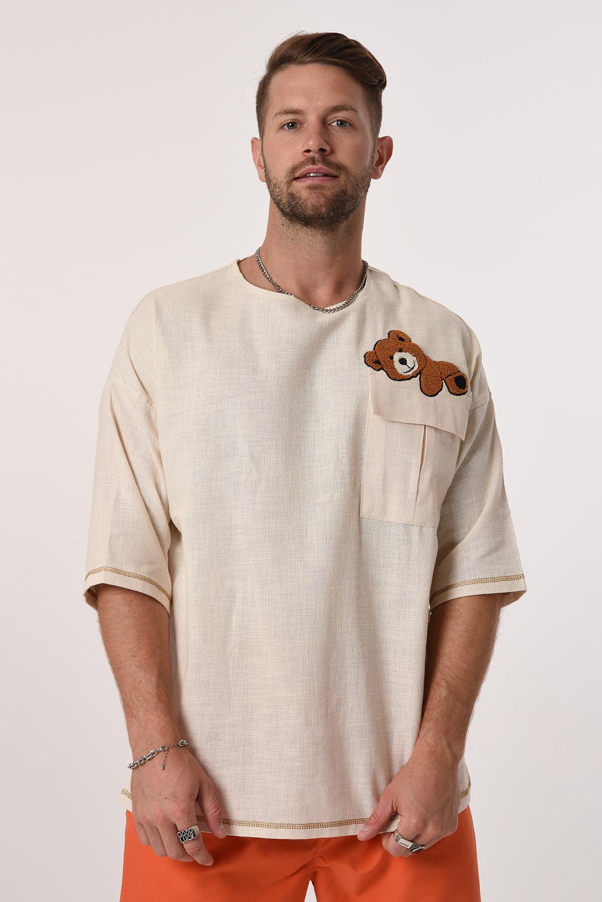 R-3703 Tek Cep Kapaklı Ayı Nakışlı Eteği Kolu Karyokalı Keten Tshirt