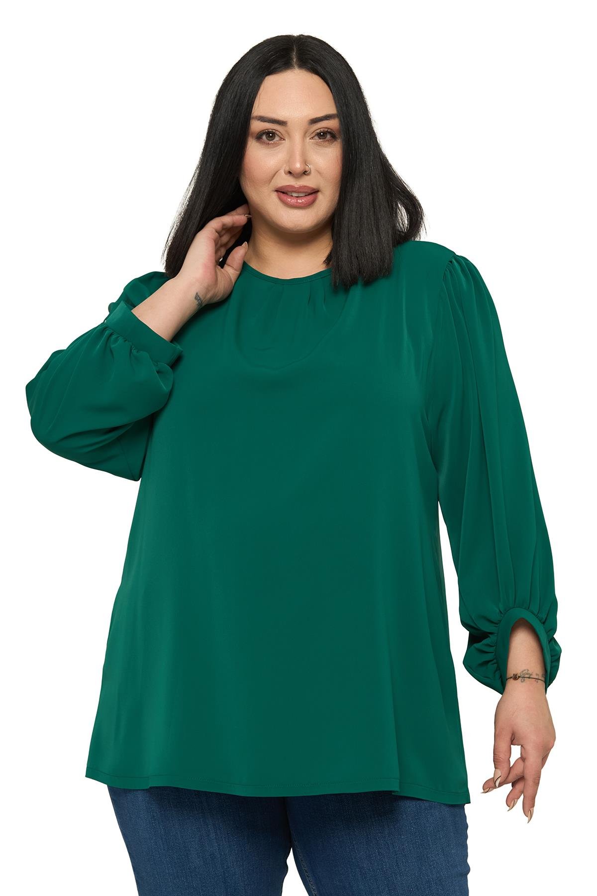 BluzDisentis Modest Büyük Beden Yuvarlak Yaka Truvakar Büzgülü Kollu Rahat Kesim Zümrüt Yeşili BluzDISENTIS MODESTBüyük Beden Yuvarlak Yaka Truvakar Büzgülü Kollu Rahat Kesim Zümrüt Yeşili Bluz