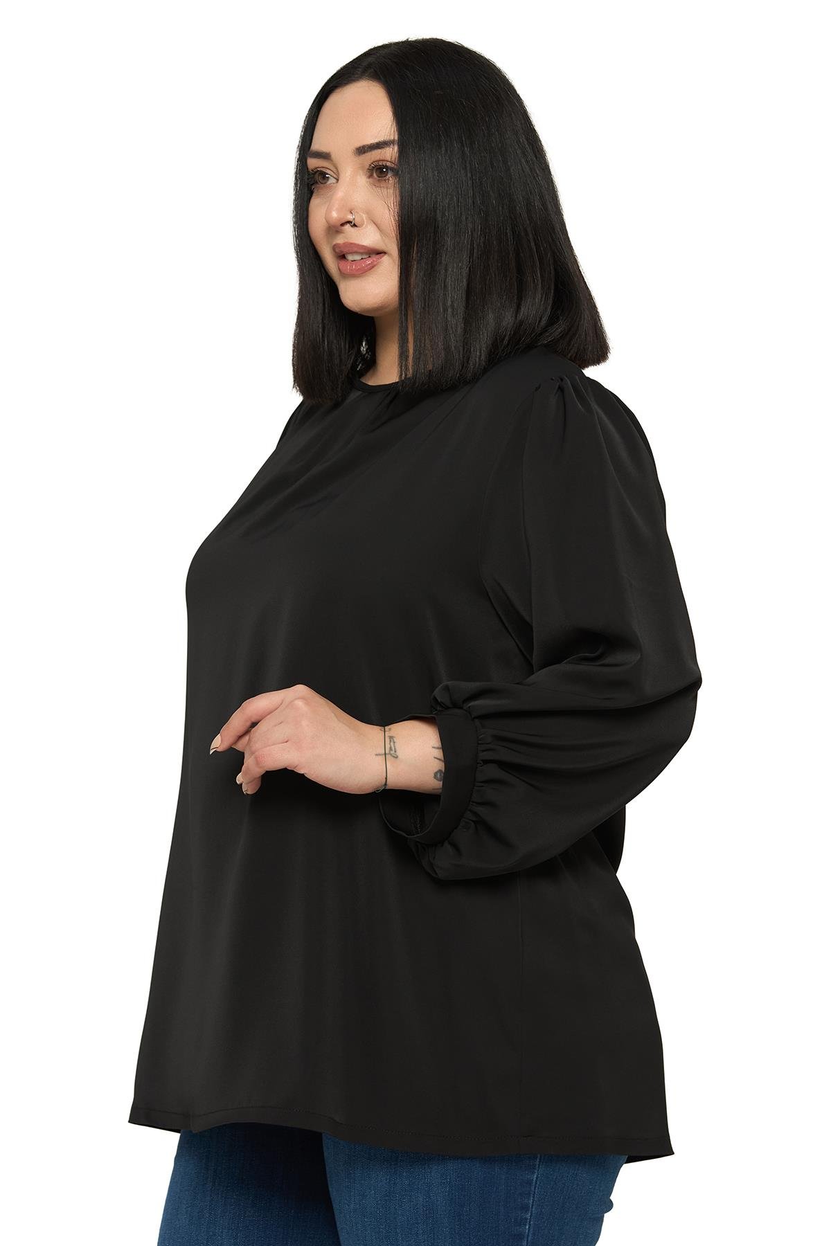 BluzDisentis Modest Büyük Beden Yuvarlak Yaka Truvakar Büzgülü Kollu Rahat Kesim Siyah BluzDISENTIS MODESTBüyük Beden Yuvarlak Yaka Truvakar Büzgülü Kollu Rahat Kesim Siyah Bluz