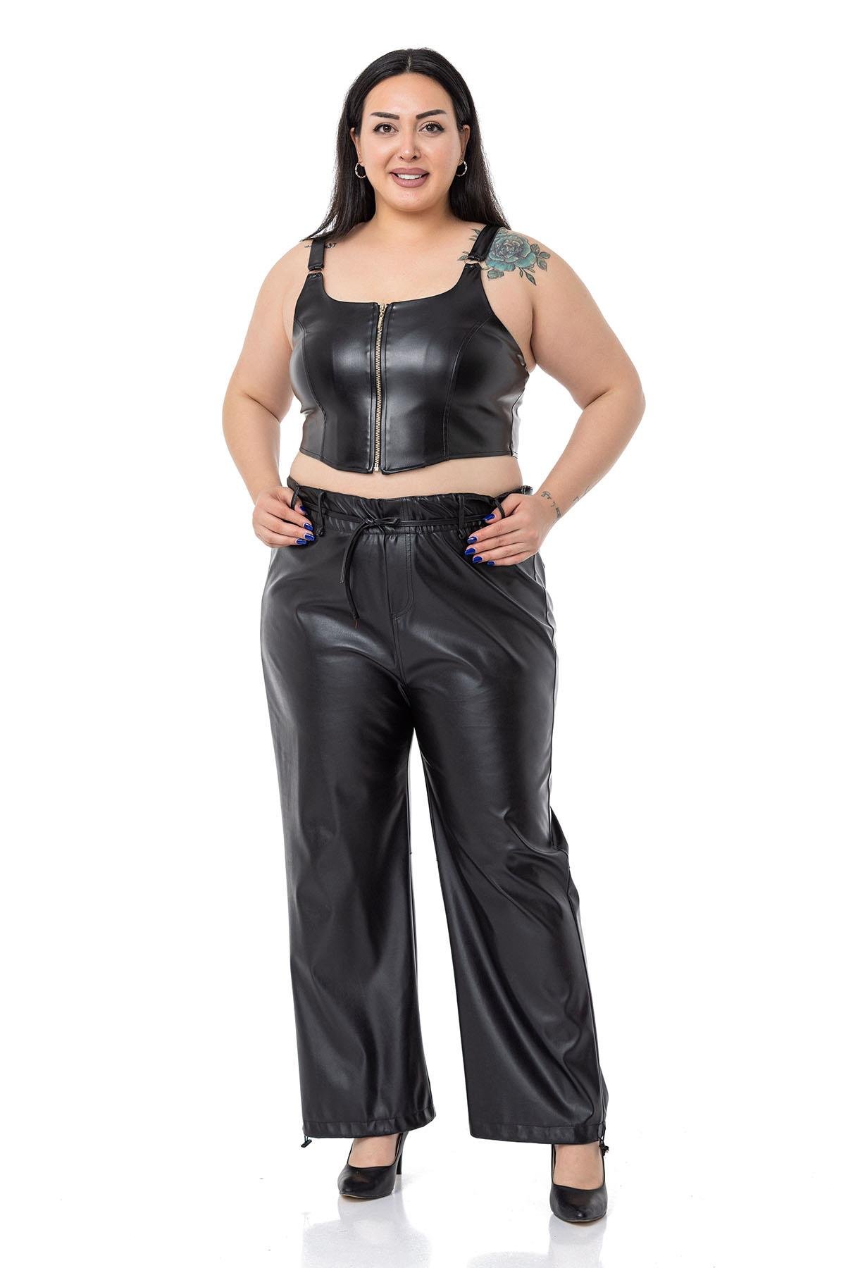 DISENTIS MODEST GENC BUYUK BEDEN DERI BUSTIYERDISENTIS MODESTBüyük Beden Fermuar Detaylı Deri Siyah Büstiyer