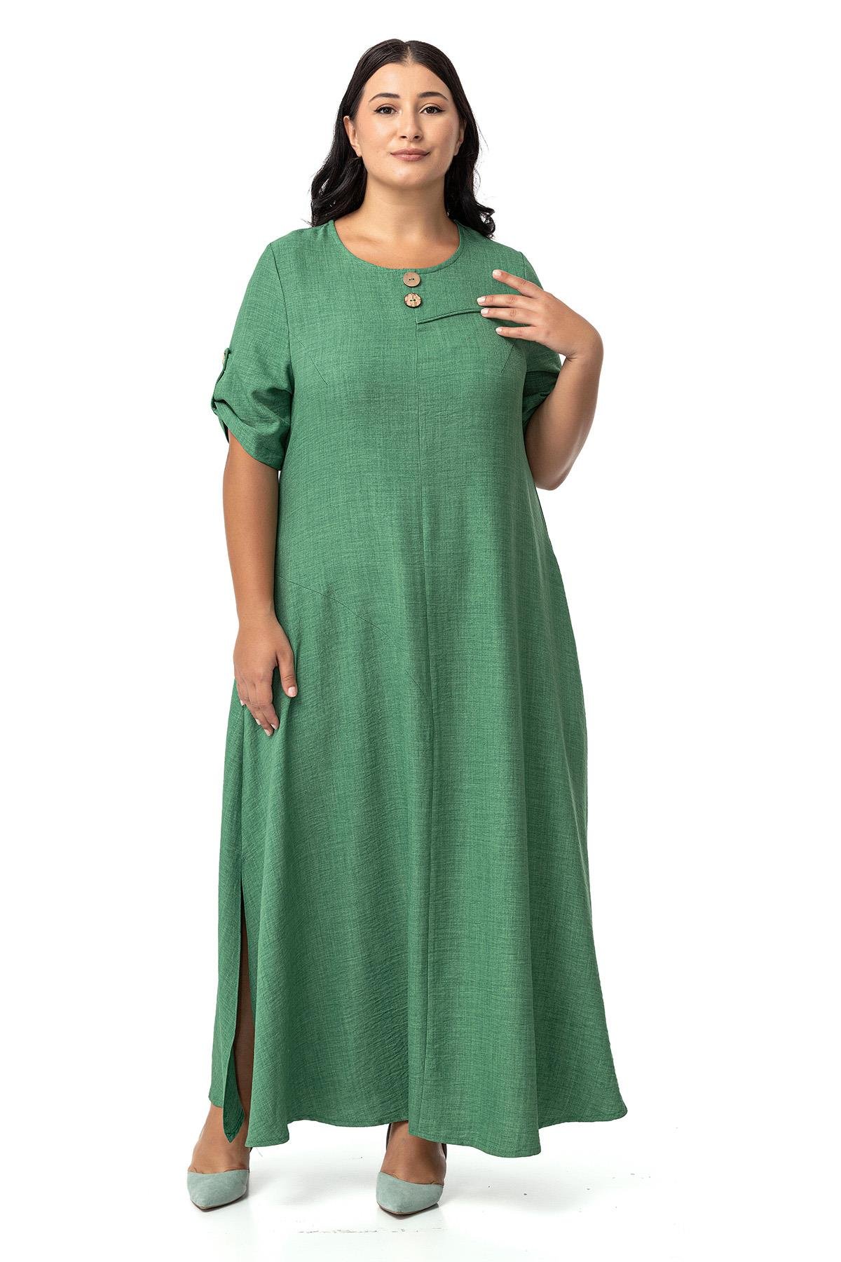 Disentis Modest Büyük Beden Katlamalı Yarım Kollu Apoletli Yırtmaçlı Uzun Yeşil Elbise DISENTIS MODESTBüyük Beden Katlamalı Yarım Kollu Apoletli Yırtmaçlı Uzun Yeşil Elbise 