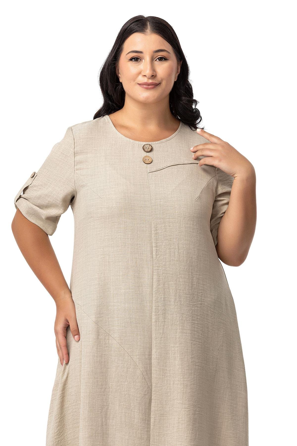 Disentis Modest Büyük Beden Katlamalı Yarım Kollu Apoletli Yırtmaçlı Uzun Bej Rengi Elbise DISENTIS MODESTBüyük Beden Katlamalı Yarım Kollu Apoletli Yırtmaçlı Uzun Bej Rengi Elbise 