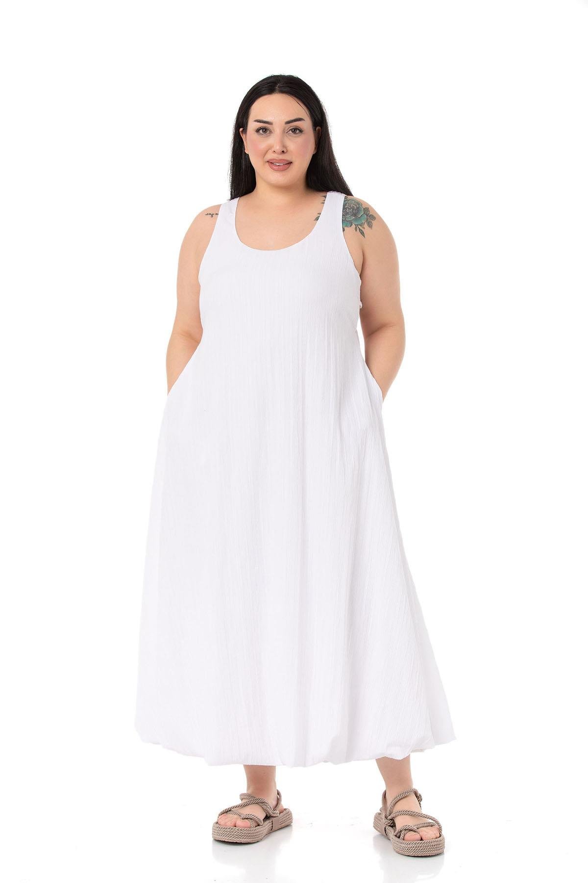 DISENTIS MODEST GENC BUYUK BEDEN UZUN BALON ELBISEDISENTIS MODESTBüyük Beden Pencere Detaylı Askılı Beyaz Balon Elbise