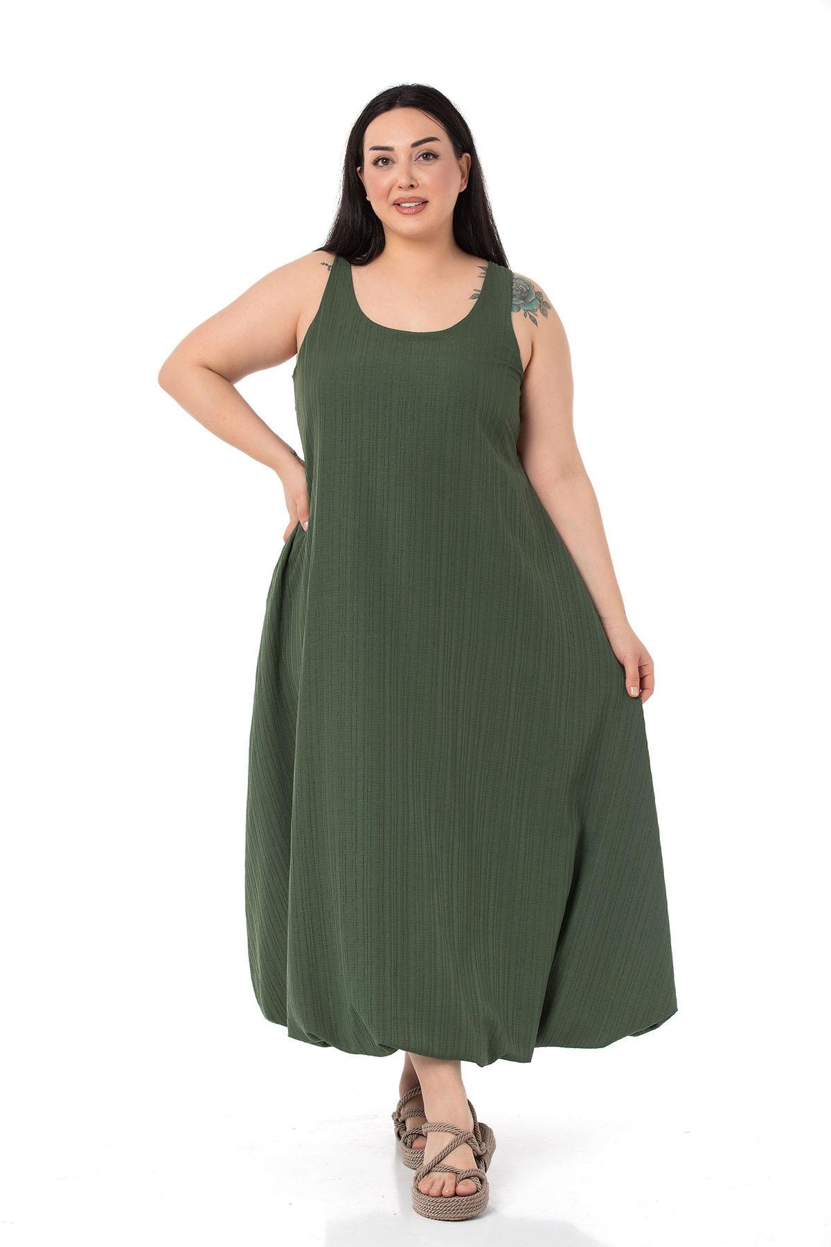 DISENTIS MODEST GENC BUYUK BEDEN UZUN BALON ELBISEDISENTIS MODESTBüyük Beden Pencere Detaylı Askılı Haki Balon Elbise