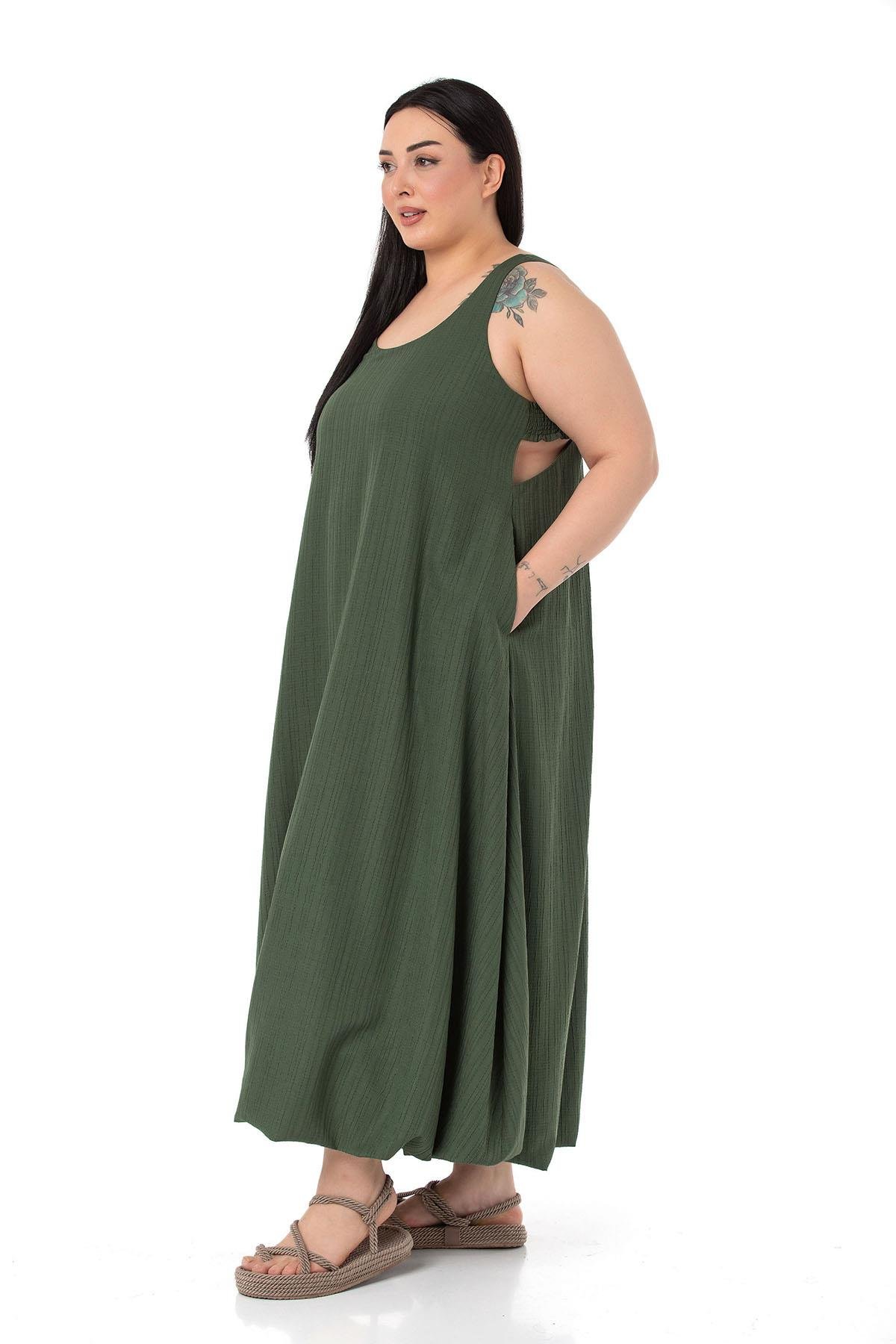 DISENTIS MODEST GENC BUYUK BEDEN UZUN BALON ELBISEDISENTIS MODESTBüyük Beden Pencere Detaylı Askılı Haki Balon Elbise