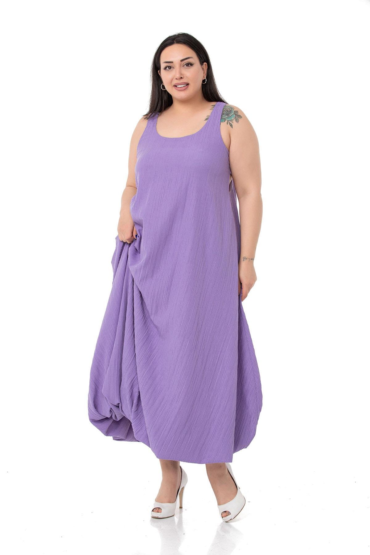 DISENTIS MODEST GENC BUYUK BEDEN UZUN BALON ELBISEDISENTIS MODESTBüyük Beden Pencere Detaylı Askılı Lila Balon Elbise