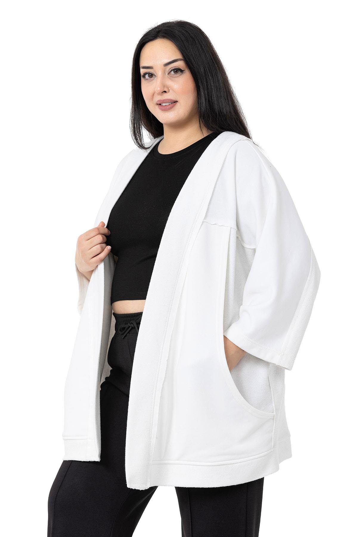 DISENTIS, BÜYÜK BEDEN, BIG SIZE, OVERSIZE, HIRKA, ÜÇ İPLİK, PİS DİKİŞDISENTIS MODESTBüyük Beden Truvakar Kollu Oversize Cepli Üç İplik Beyaz Hırka