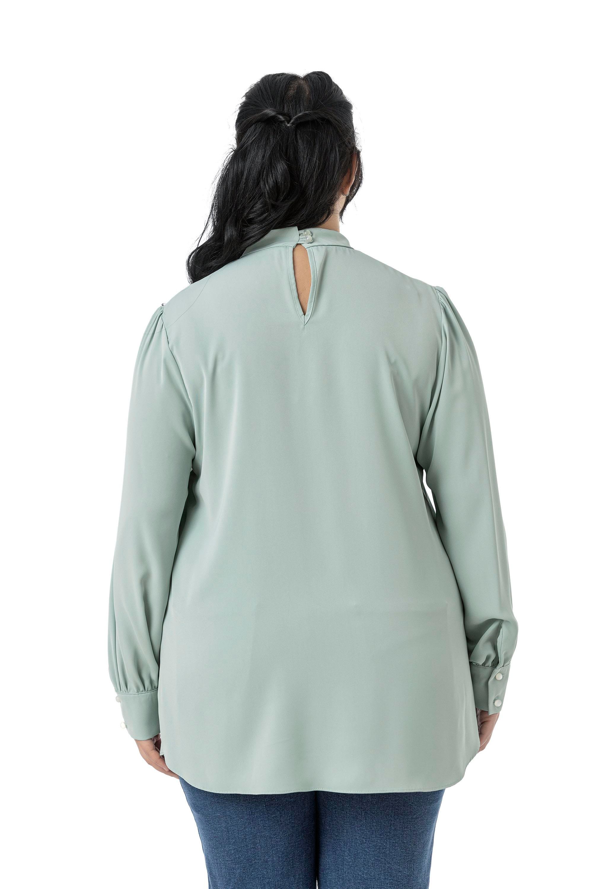 Disentis Modest Büyük Beden Yakası Arkadan Düğmeli Dik Yaka Dökümlü Mint Yeşili BluzDISENTIS MODESTBüyük Beden Yakası Arkadan Düğmeli Dik Yaka Dökümlü Mint Yeşili Bluz