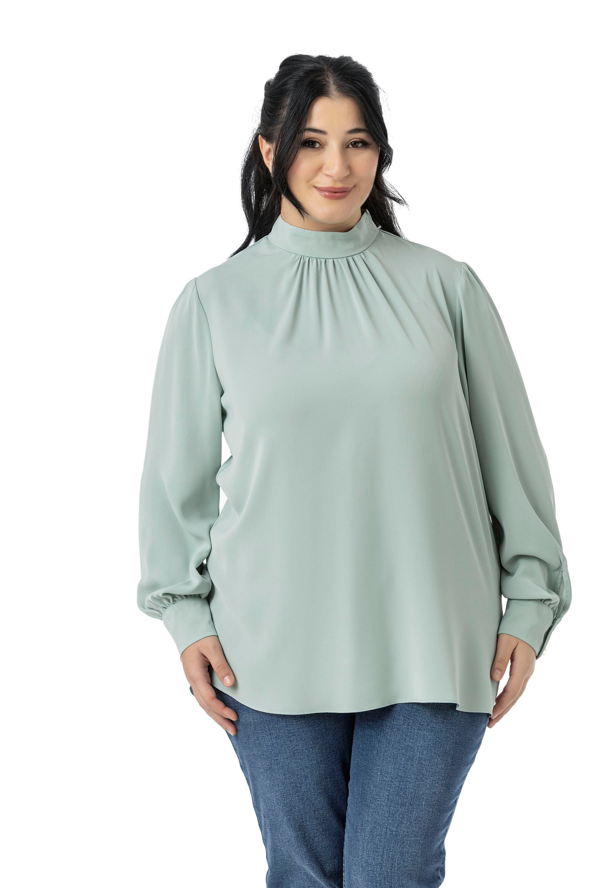 Disentis Modest Büyük Beden Yakası Arkadan Düğmeli Dik Yaka Dökümlü Mint Yeşili BluzDISENTIS MODESTBüyük Beden Yakası Arkadan Düğmeli Dik Yaka Dökümlü Mint Yeşili Bluz